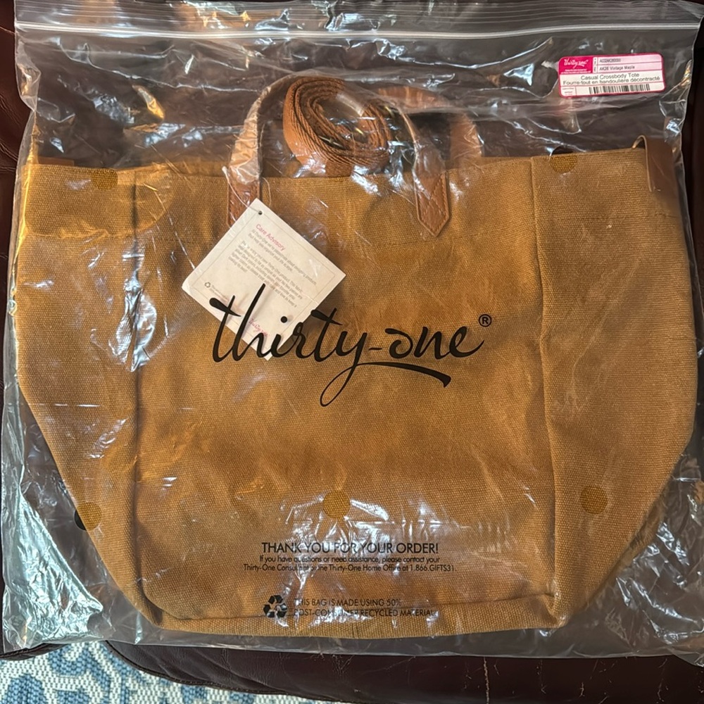 Thirty-One Casual Crossbody Tote never taken out of the bag